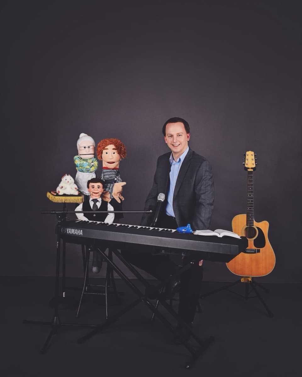 Stephen Forester with a guitar